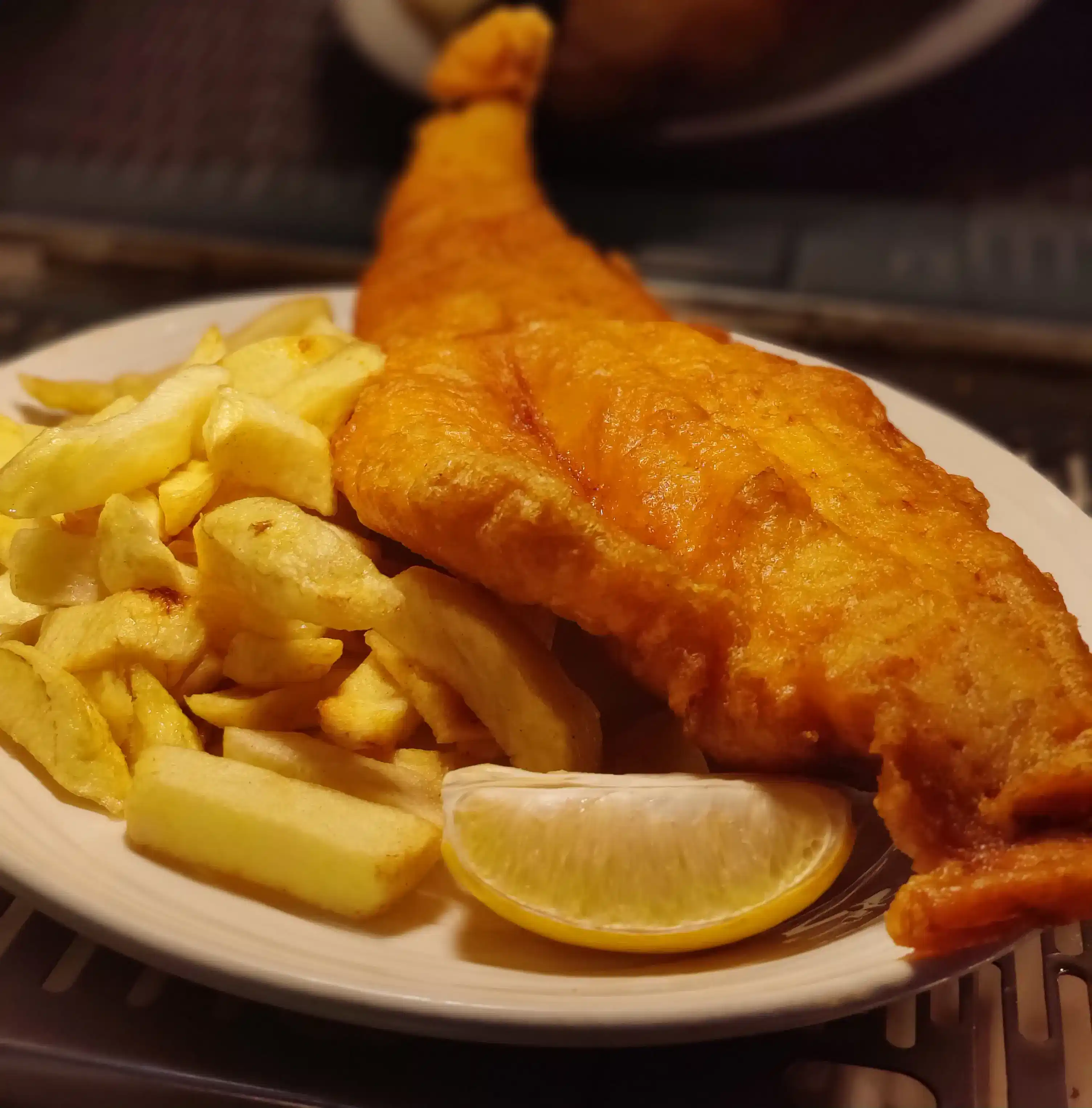 a picture of haddock and chips served in the restaurant